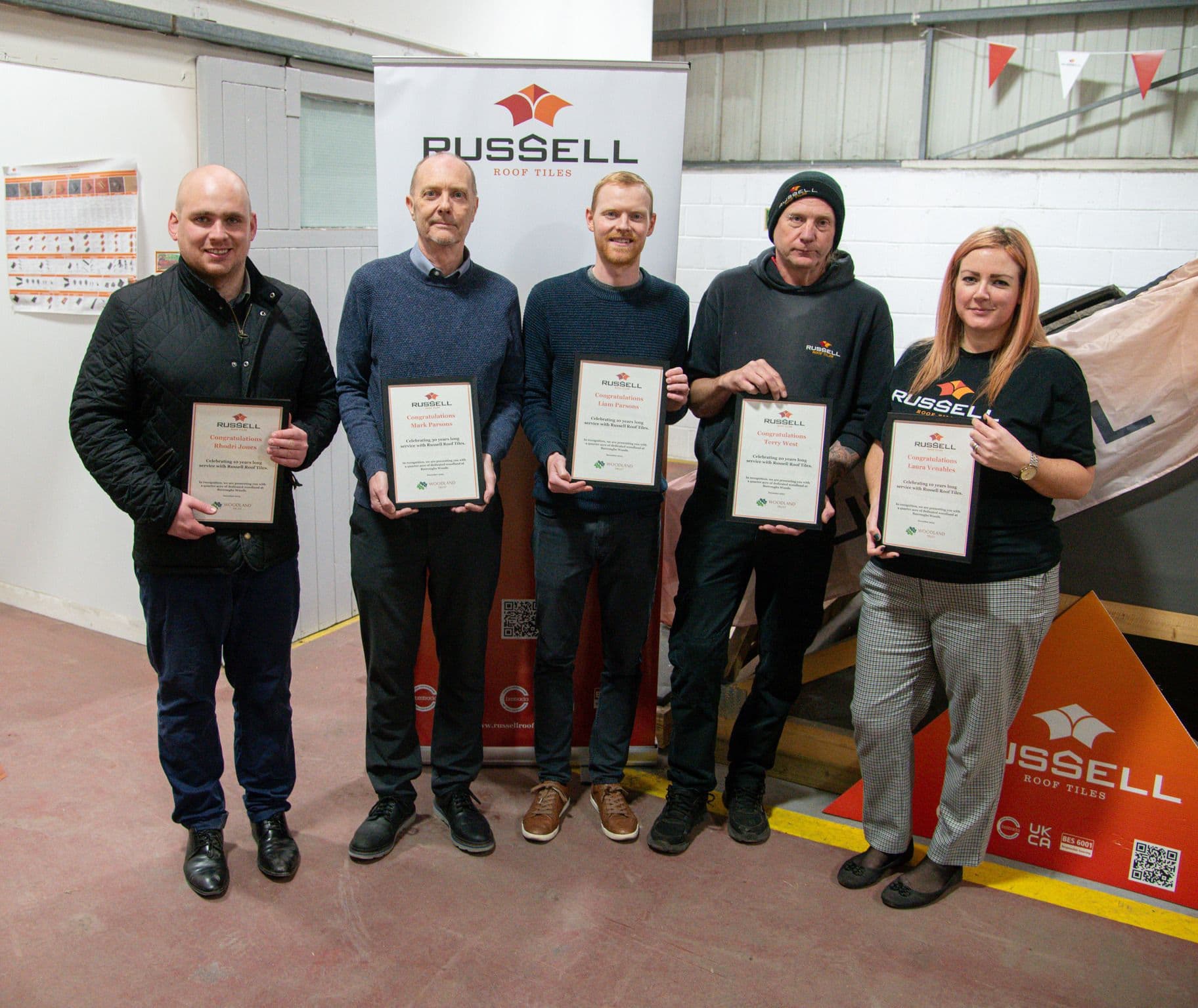 Team celebrates two centuries of long service